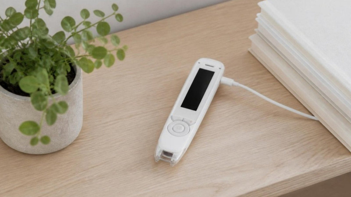 C-Pen Reader 2 charging on a shelf