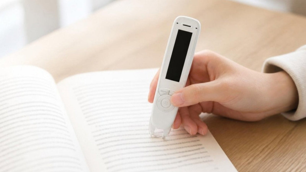Hand scanning a book with a C-Pen Reader 2
