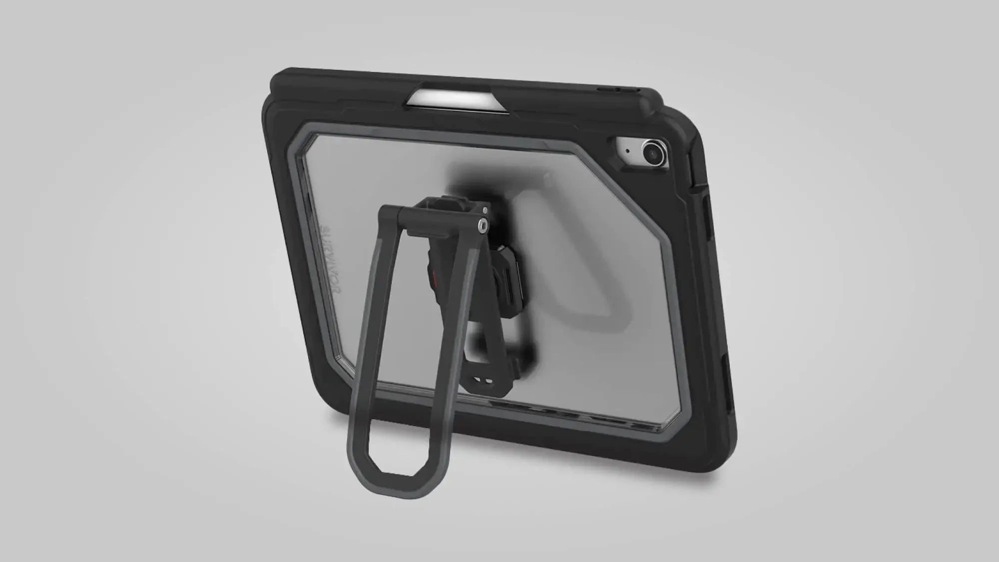A rugged tablet case with a transparent back and black edges, shown with its built-in adjustable stand extended, supporting the tablet in a landscape orientation.