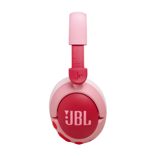 A pair of JBL Junior 470 Noise Cancelling Over-Ear Headphones in pink, photographed from the side to display the ear cup with the JBL logo and adjustable headband.