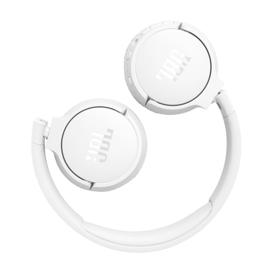 The white JBL Tune 670 Noise Cancelling Headphones (On-Ear) by JBL are shown with ear cups folded inward for compact storage against a light grey background.