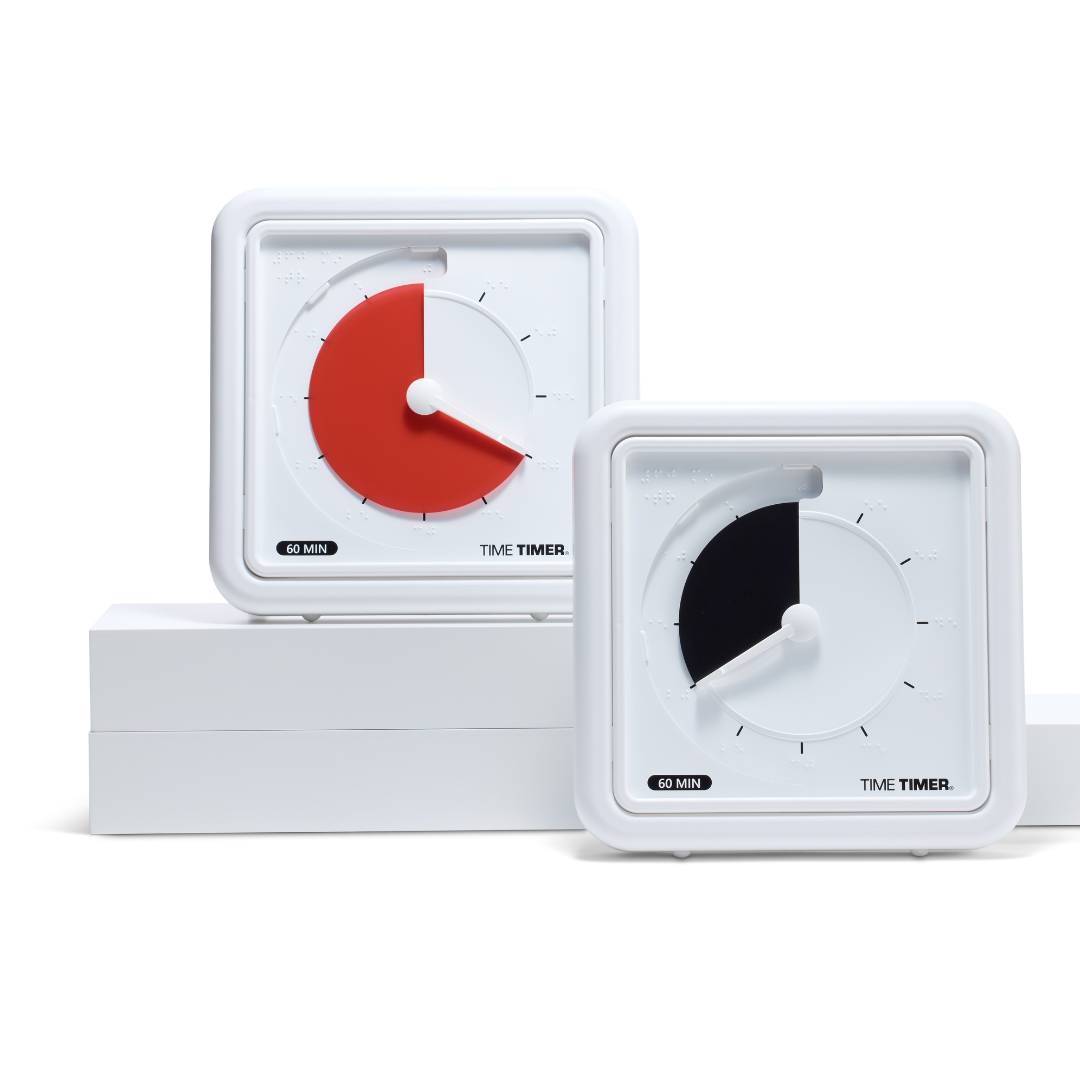 Two square white Time Timer Braille (8 Inch) timers by Time Timer are shown on white blocks. One shows 38 minutes left with a red section, the other 16 minutes with a black disk. Both offer accessible assistive technology.