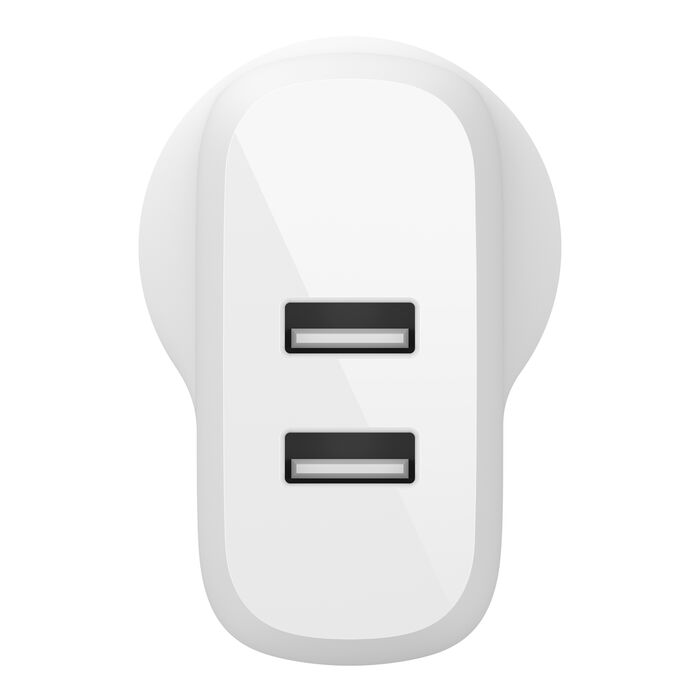 The Belkin 24W Dual USB-A Power Adapter features two vertically stacked USB ports, shown front-facing on a white background, and is designed by Belkin for fast device charging.