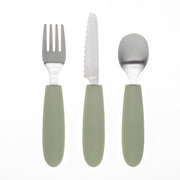The KiddiKutter Kids Cutlery Set [Sage] by KiddiKutter includes a fork, serrated knife, and spoon with sage handles—ideal for encouraging self-feeding skills. Arranged side by side on a white background.