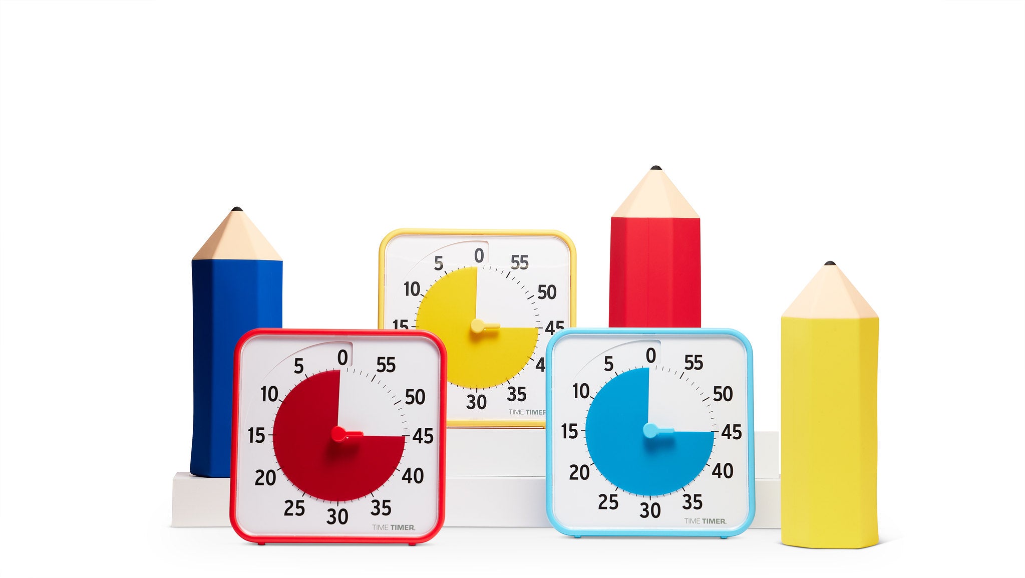 The Time Timer Original 8-inch Learning Center Classroom Set by Time Timer showcases three colorful square visual timers (Primary Colour Collection) in front of large, pencil-shaped props—ideal for classroom time management on a white backdrop.