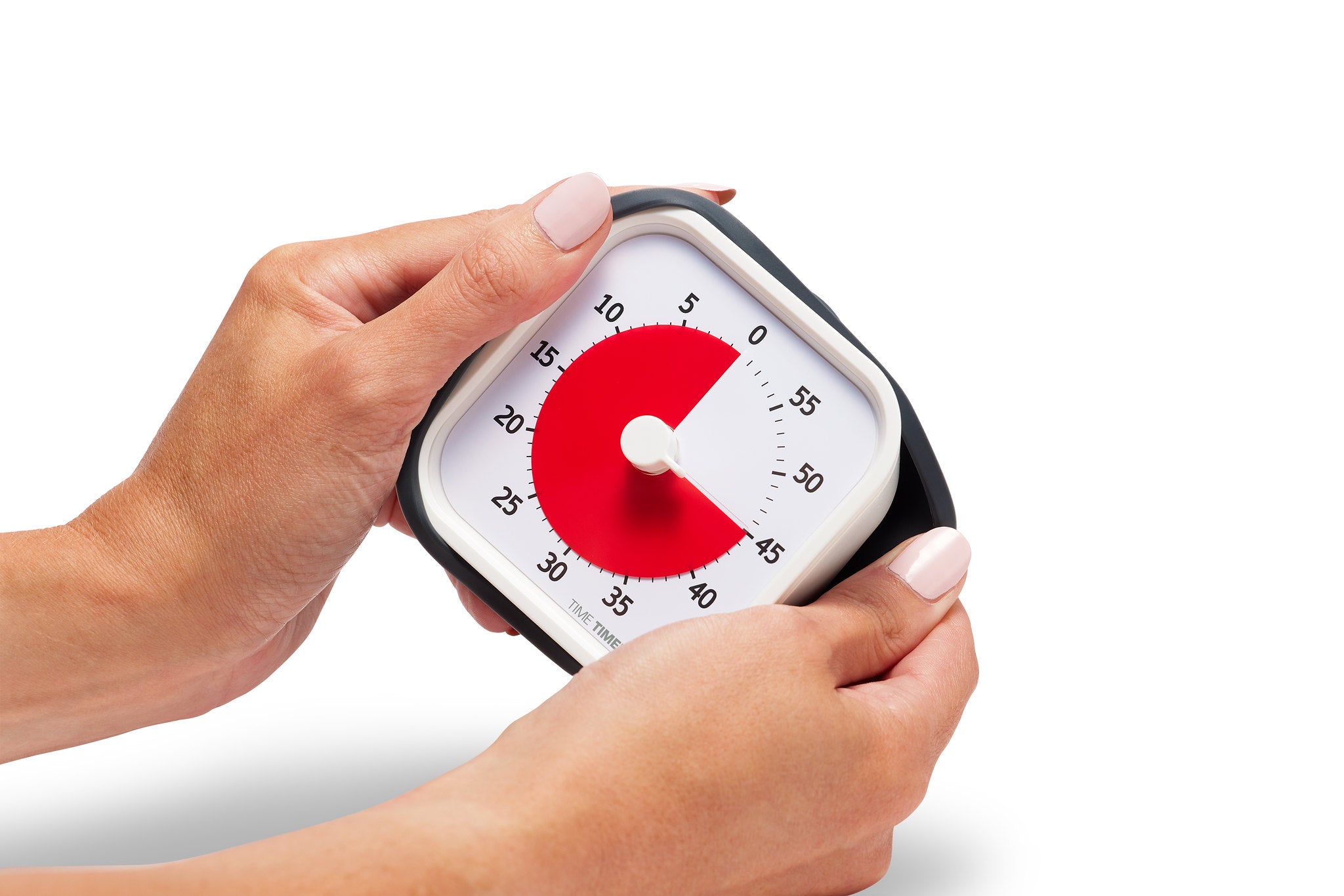 A person with light skin and manicured nails holds a Time Timer MOD [Berry/Charcoal] (60 min) by Time Timer, displaying 20 minutes left with a red section. The background is white.