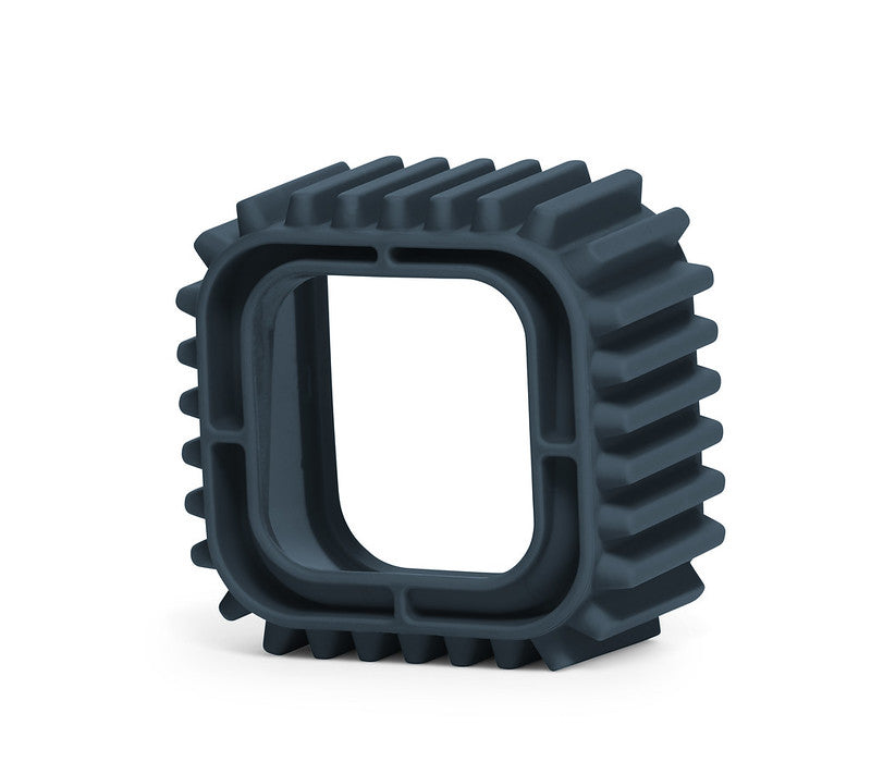 The Time Timer MOD Cover Silicone Case Accessory by Time Timer is a dark gray, square-shaped silicone cover with ribbed, gear-like edges and a hollow center, shown standing upright on a white background.