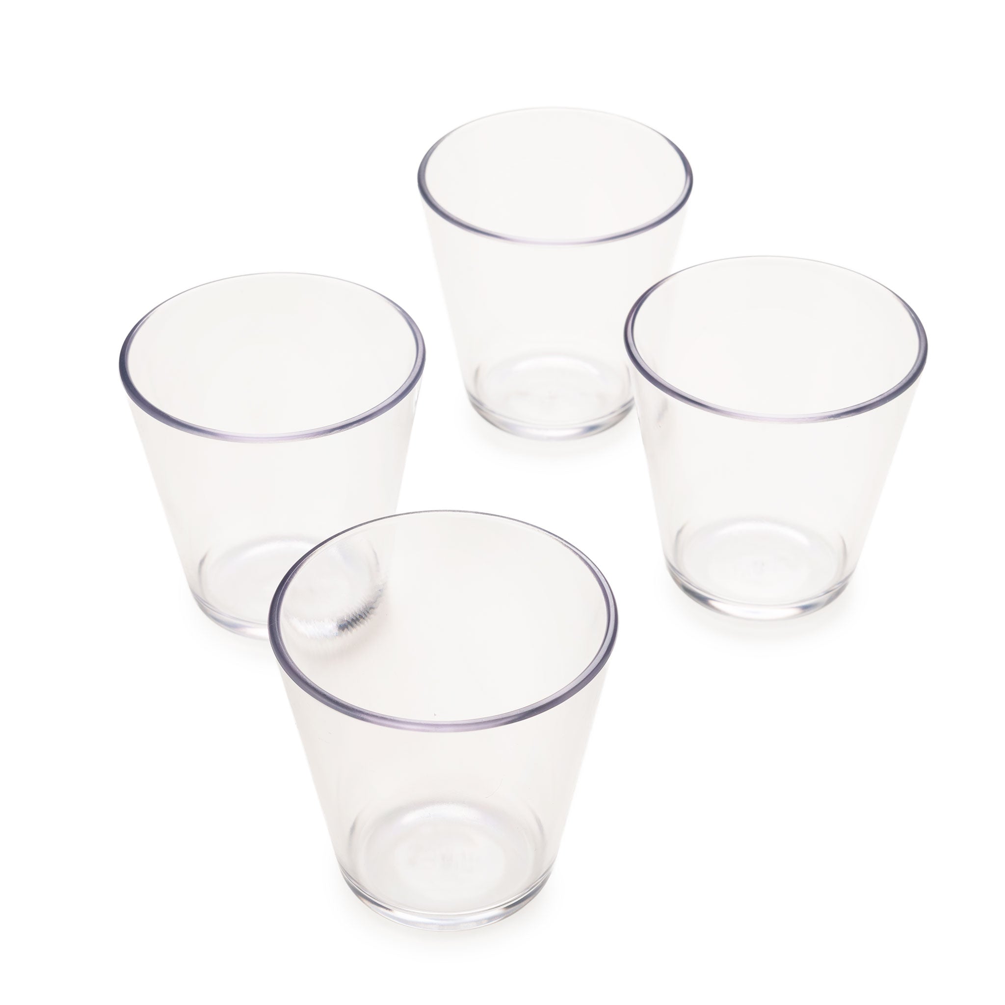 Four clear, empty Rika Easy Grip Cup [Neutral] cups are arranged in a loose cluster on a white background, each tilted slightly in a different direction.
