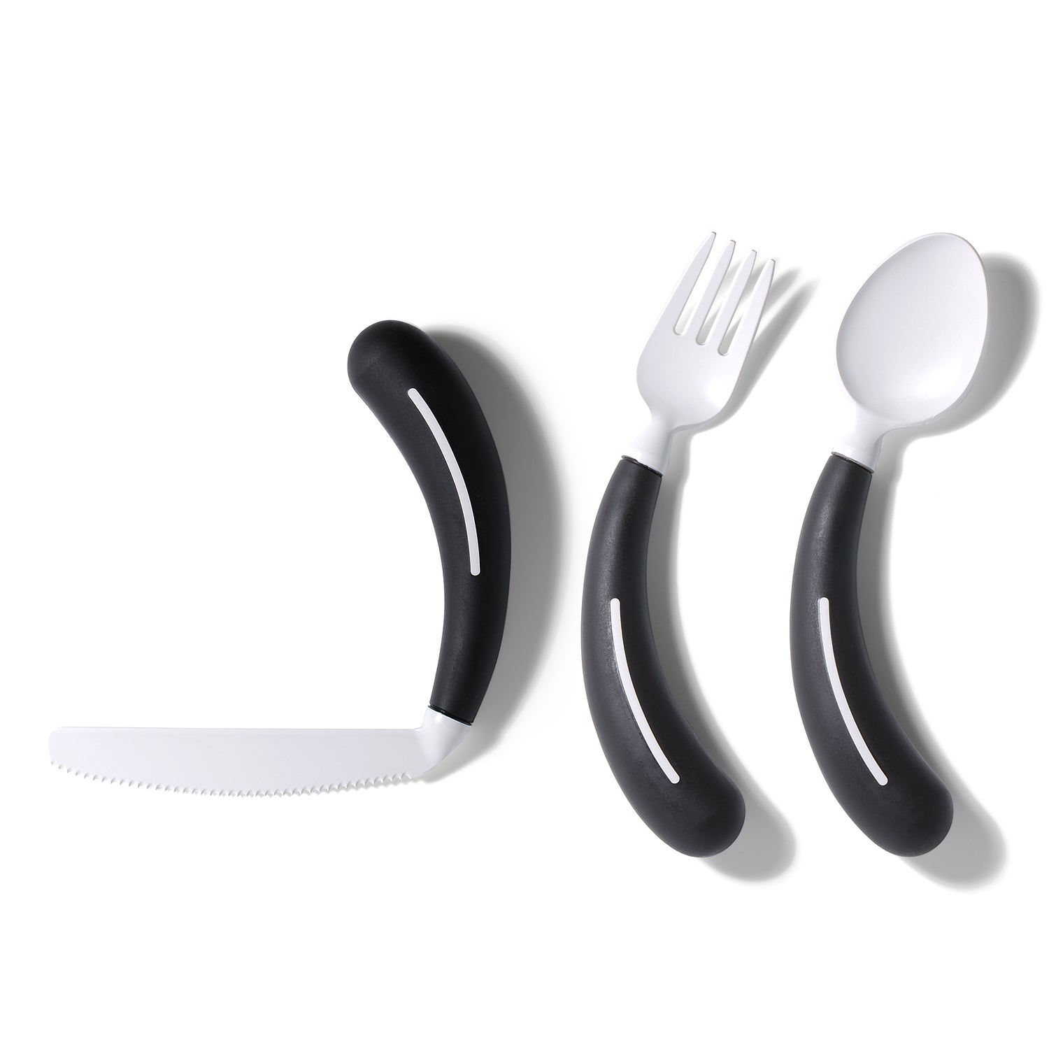 The Henrotek HenroGrip Cutlery Bundle [Black] (Left) features a knife, fork, and spoon with thick, curved black handles and white accents, displayed on a white background as an easy-grip adaptive set.