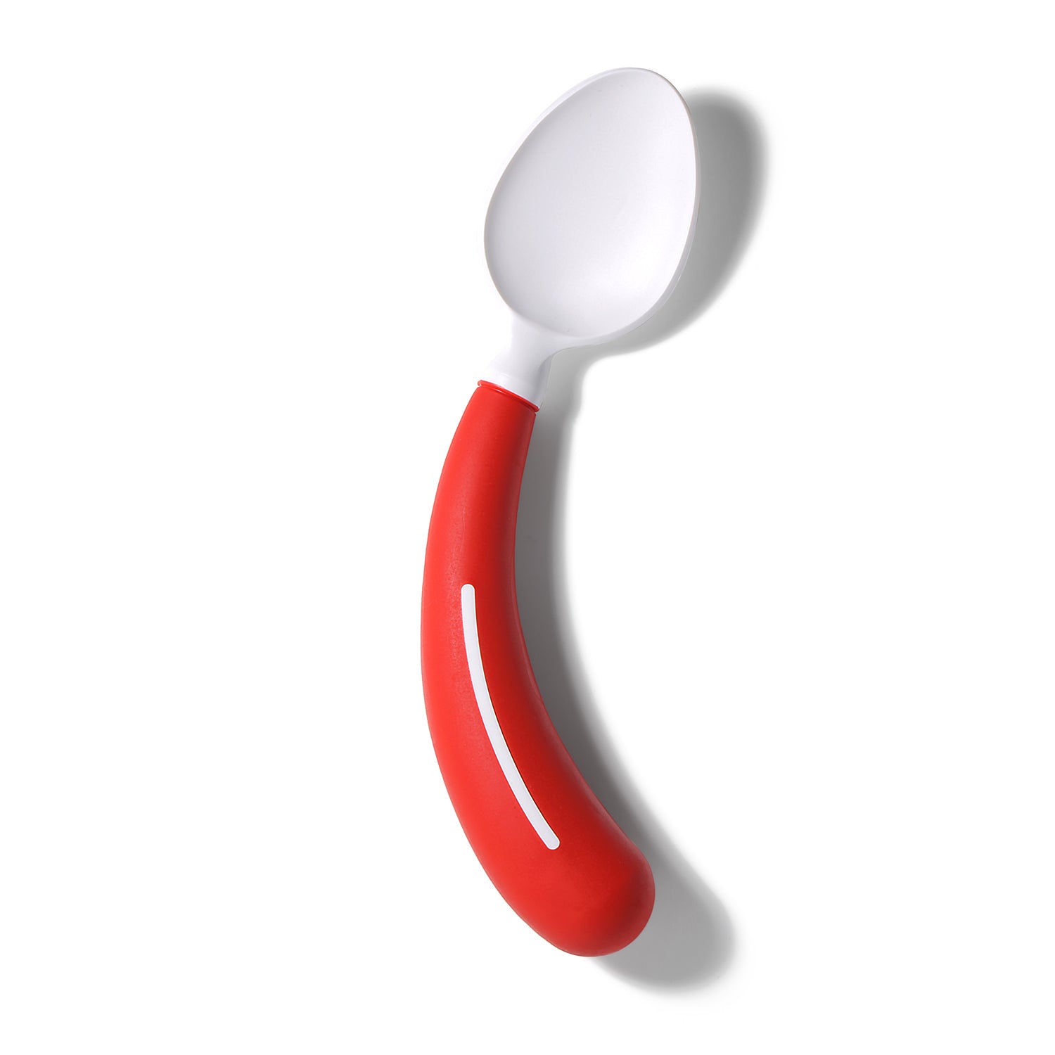 The Assistive Tech HenroGrip Spoon - Red (Left-Handed), an ergonomic adaptive cutlery item with a white bowl and curved red handle with a white stripe, is displayed on a white background with its shadow to the right.