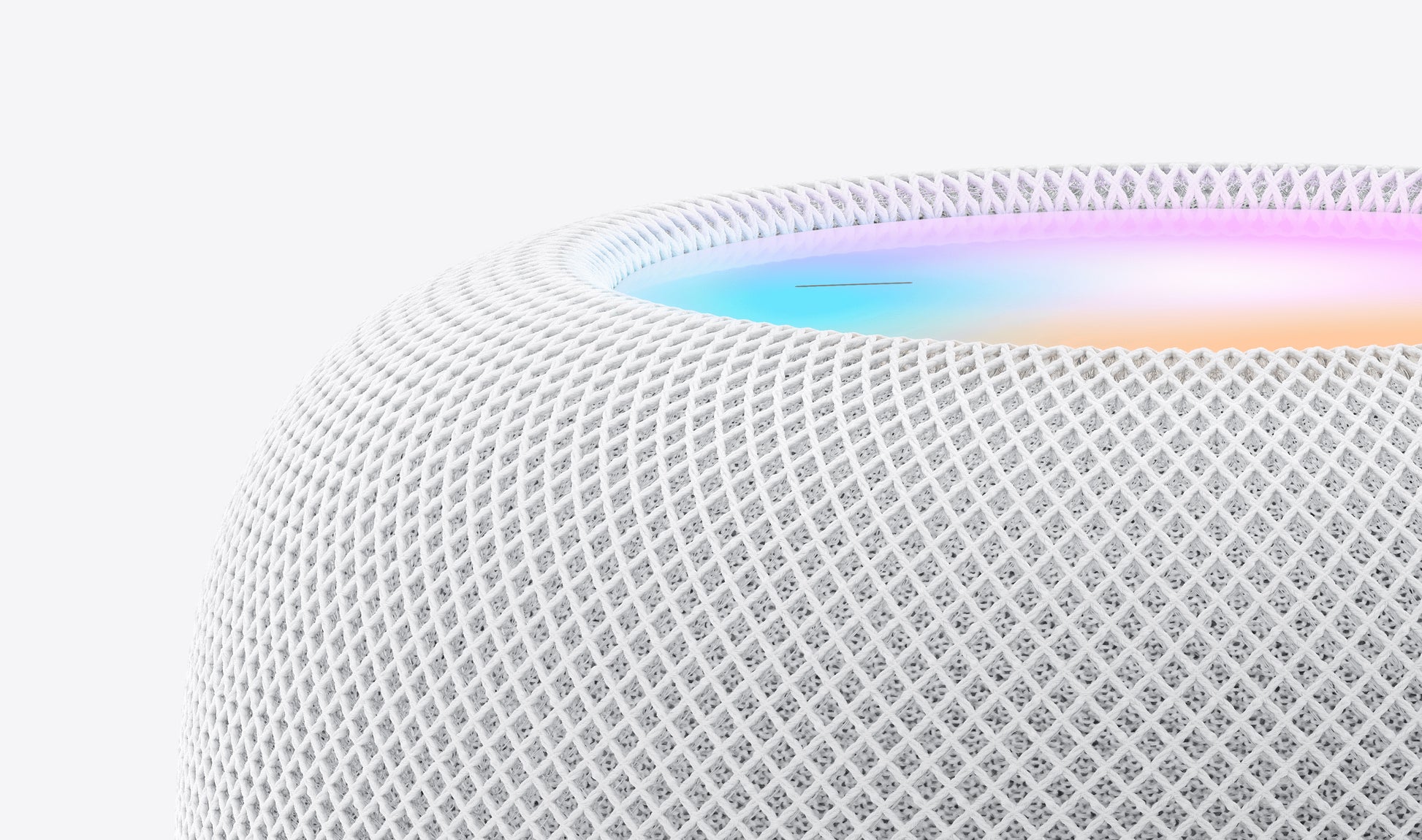 A close-up of the Apple HomePod (2nd Gen) [White], featuring a mesh exterior and a glowing, multicolored touch surface—ideal for seamless Siri integration in your smart home.