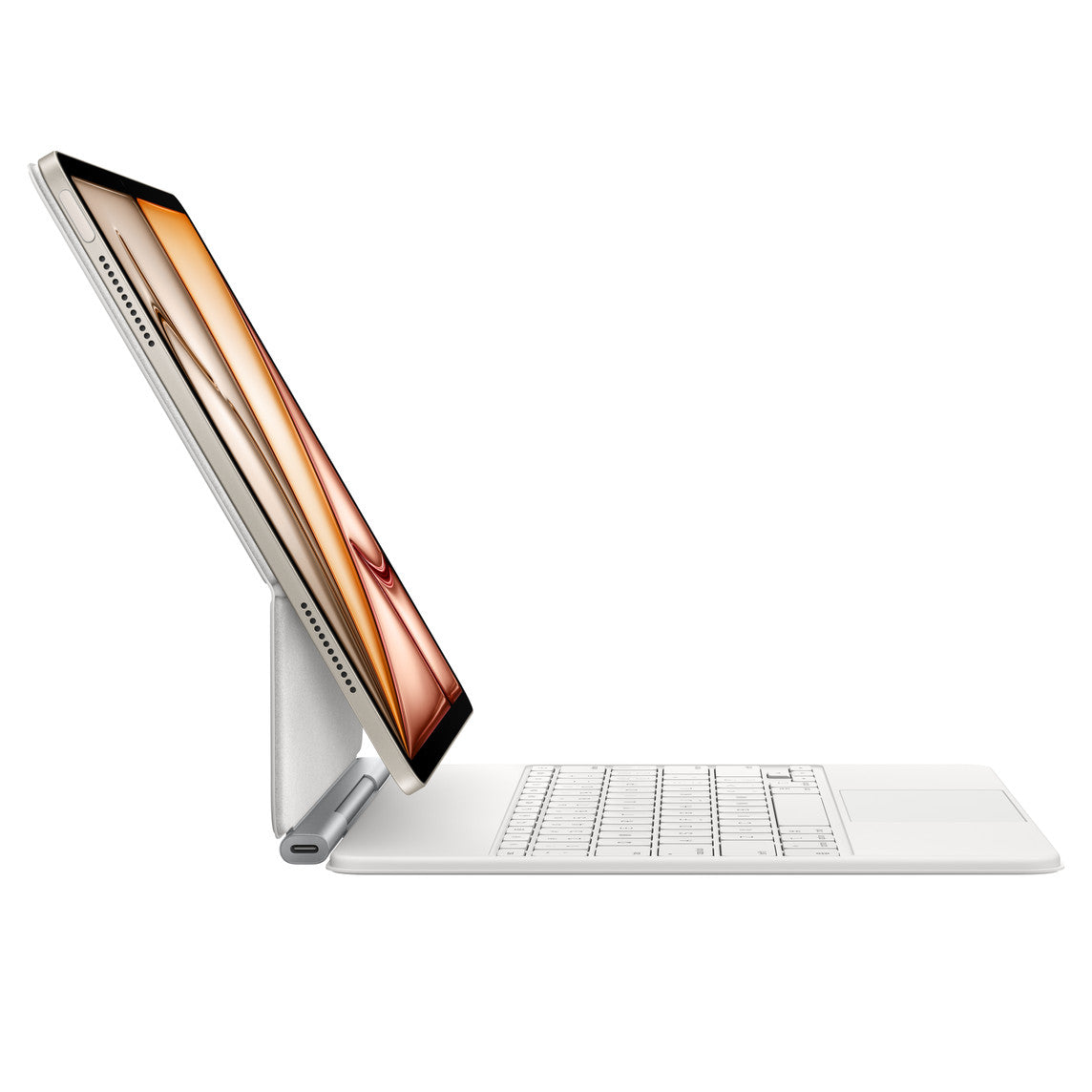 An Apple iPad Air 13-inch (M3/M4) is attached to an Apple Magic Keyboard for iPad Air 13-inch (M3/M4) US English, angled to show a side view on a plain white background.