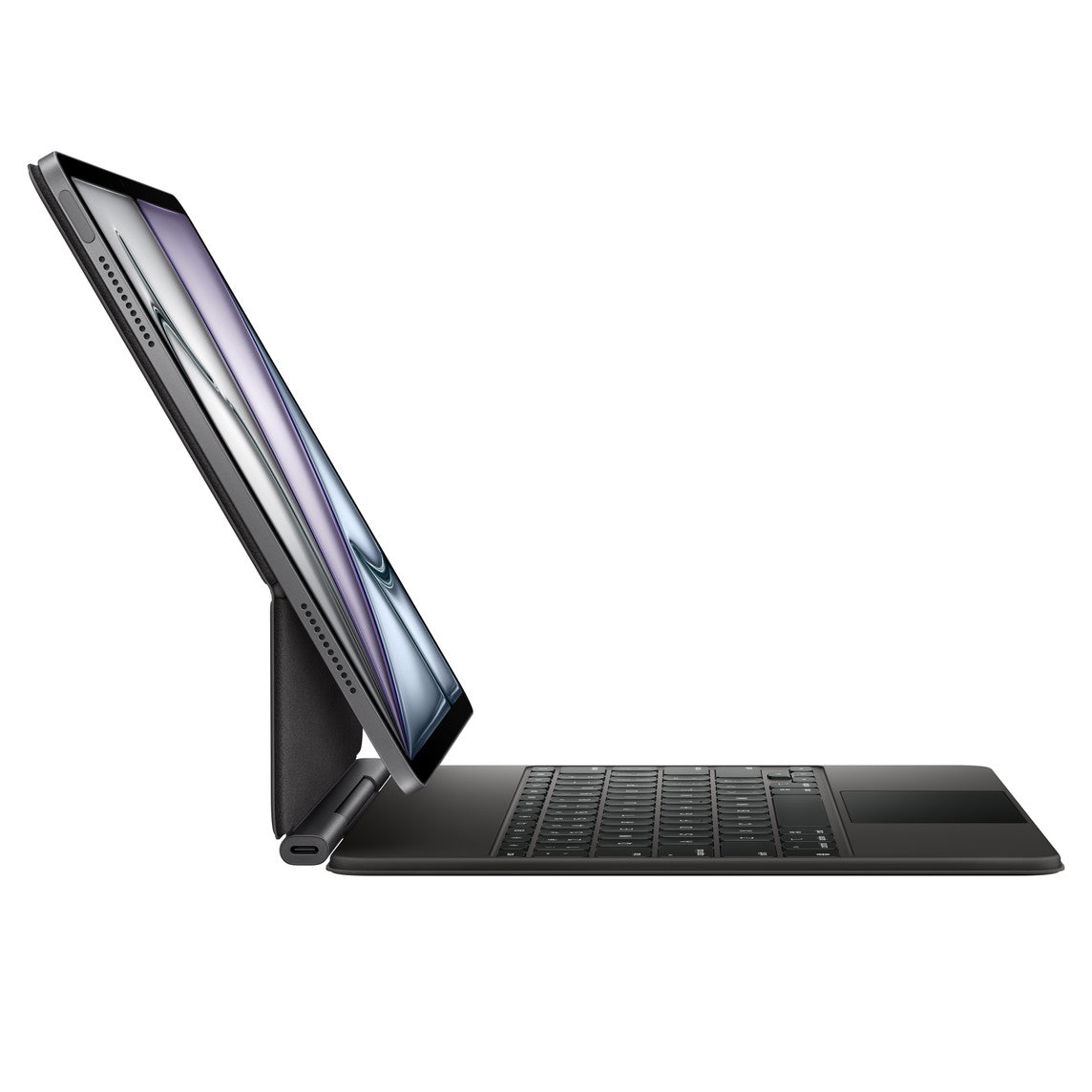 A side view of the Apple Magic Keyboard for iPad Air 13-inch (M3/M4) shows it attached to a tablet like a laptop, with an upright screen and its sleek, modern black full-size backlit keyboard and touchpad visible. Brand: Apple.