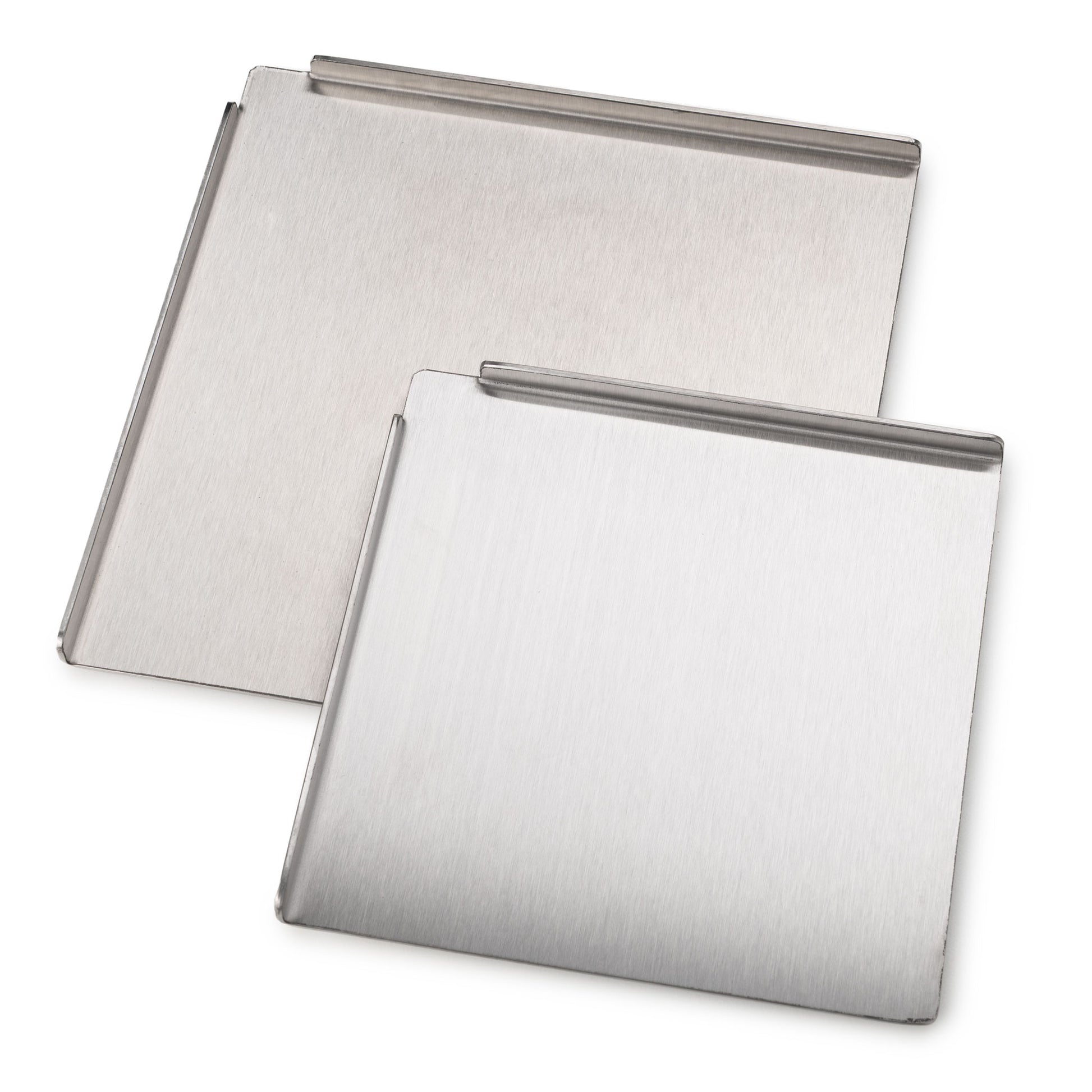 The Rika Sandwich Board (Small) features two square stainless steel sheets with a raised edge on one side, overlapping on a white background—ergonomically designed for easy sandwich-making and ideal for those with limited hand mobility.