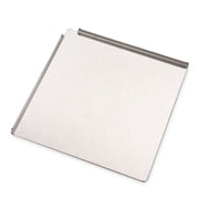 The Rika Sandwich Board (Large) is a metal baking sheet with a flat surface and two raised edges, featuring an ergonomic design. Shown against a white background.