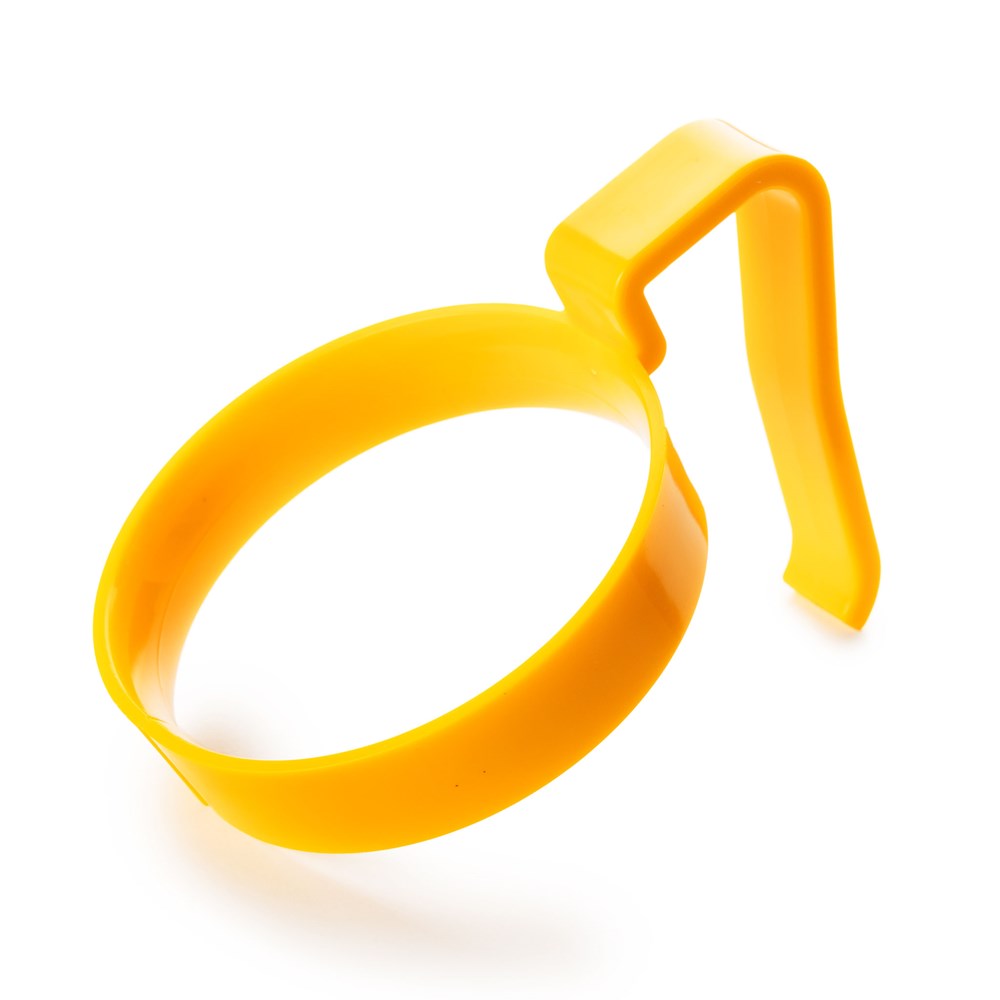 The Rika Sure Grip Handle Accessory by Rika is a yellow plastic egg ring designed for shaping eggs or pancakes in a frying pan, perfect for those with limited hand strength.