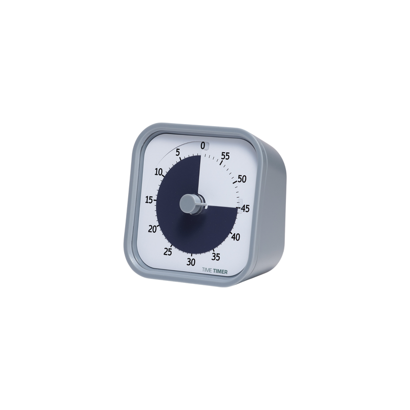 The Time Timer MOD - Home Edition [Pale Shale Grey] by Time Timer shows about 38 minutes left with a dark shaded area from 0 to 38 on its white face. Its visual countdown aids routine management and it's slightly angled to the right.