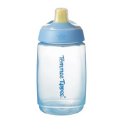 The Tommee Tippee Active Spout Cup 390mL is a clear toddler cup with a blue lid and soft, bite-proof spout. It features an easy-grip design, leak-proof use, and the Tommee Tippee logo printed vertically on the side. Suitable for ages 12m+.