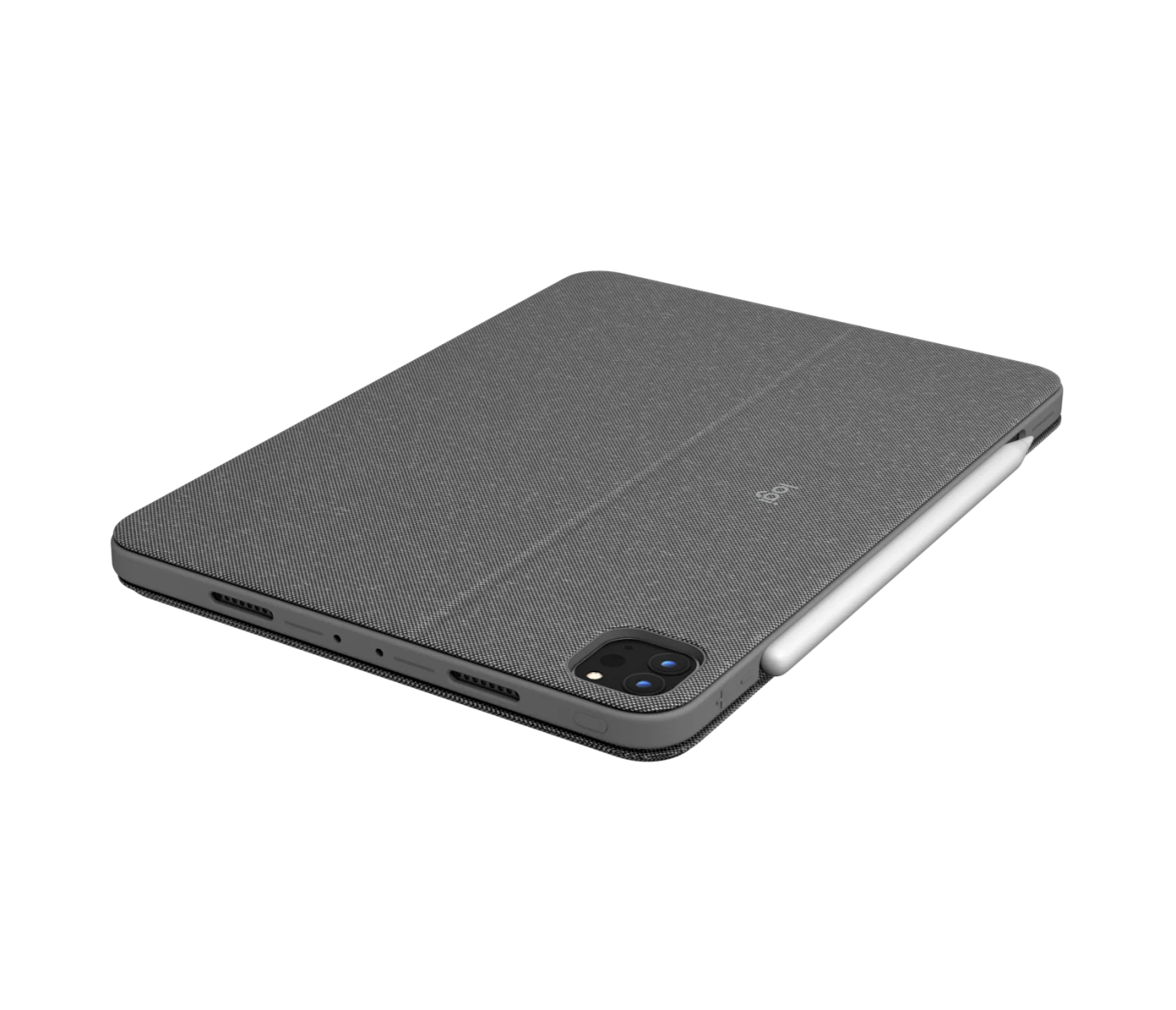 A gray iPad 12.9 (5th/6th Gen) fitted with the Logitech Combo Touch Keyboard Case and stylus lies face down on a white background, showing the rear camera, speaker grills, and integrated trackpad keyboard by Logitech.