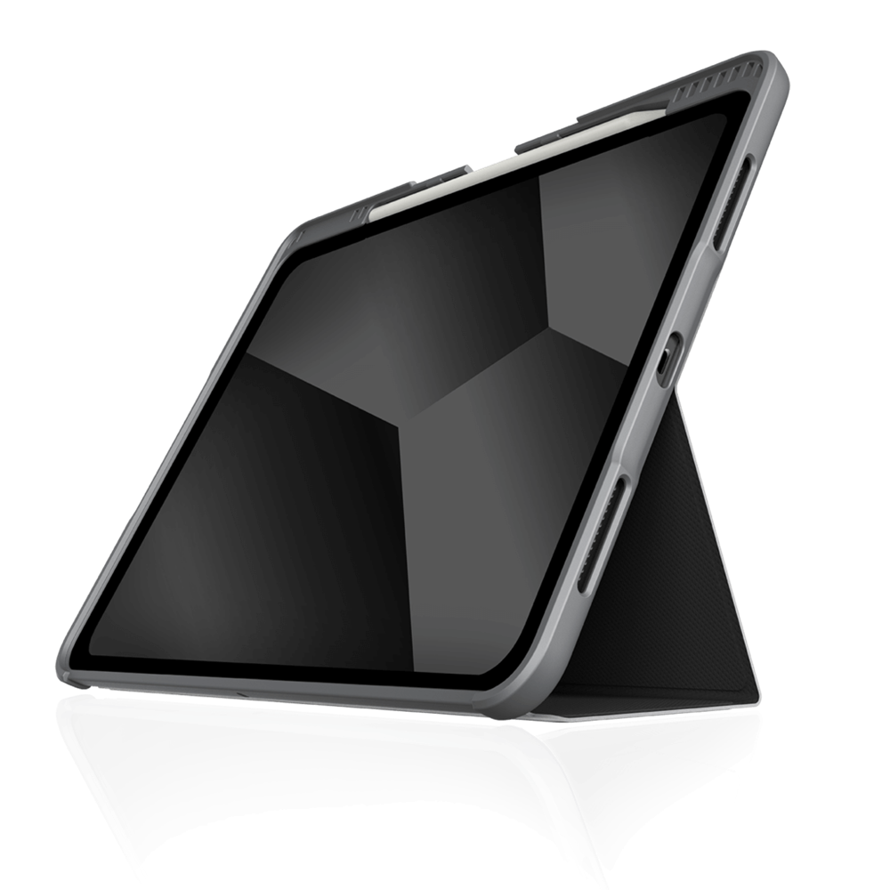 The STM Dux Plus Case [Black] for iPad Pro 13-inch M4 is shown angled with its folding stand, displaying the screen, side ports, and Apple Pencil charging, set against a plain white background.