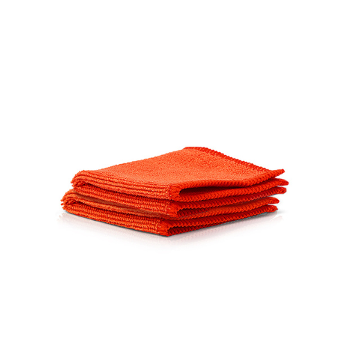 Stack of WHOOSH! orange microfibre cloths on a white background, designed for streak-free cleaning of screens, glasses and devices.