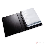 The Attainment Talking Photo Album is a black binder with a tactile display and transparent sheets, serving as an assistive communication aid. When open, the device appears on the right, enhancing accessibility like modern photo albums.