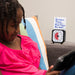 A picture of a time timer 3 inch with a dry erase card that says "screen time then time for bed" with a child holding a tablet in the foreground.