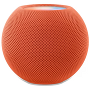 The Apple HomePod mini [Orange] by Apple features a round mesh exterior, a flat top with subtle colored lights, and delivers rich 360-degree audio.